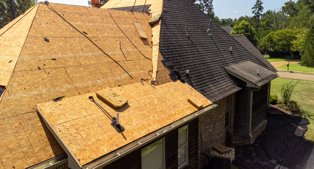 Roof decking exposed partway through a roof replacement
